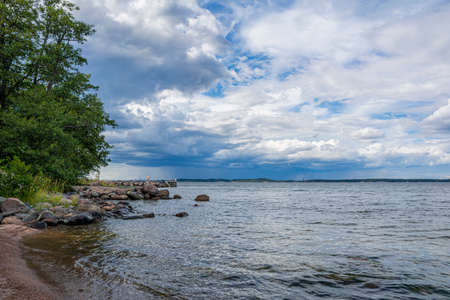View of the stormy sky and Gulf of Finland, Isosaari island, Helsinki, Finlandの写真素材