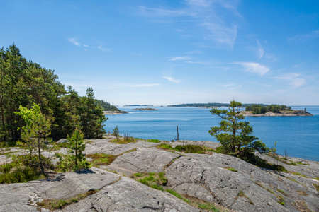 The rocky view of Porkkalanniemi and view to the Gulf of Finland and island on the background, Finlandの写真素材