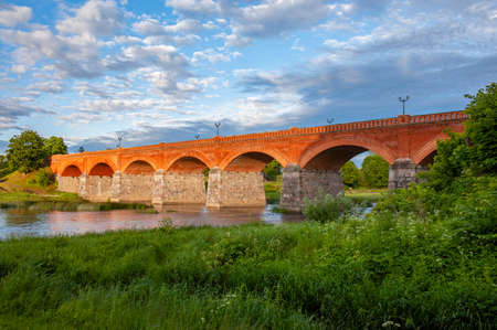 The Old Brick Bridge across the Venta river, Kuldiga, Latviaの写真素材
