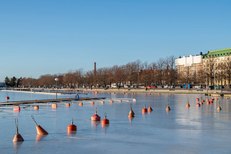 Helsinki, Finland - January 25, 2021: View to The Gulf of Finland and Merisatamanranta area in winterのeditorial素材