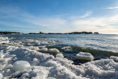 View of the coast and Gulf of Finland in winter, Kopparnas, Inkoo, Finlandの写真素材