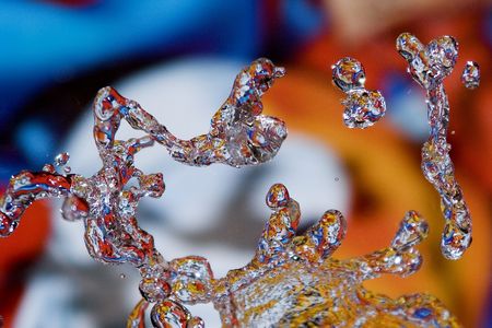 a water liquid form with a color backgroundの写真素材