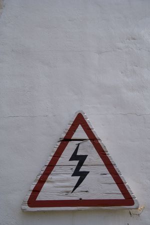 A sign alerting to danger of electrocusion