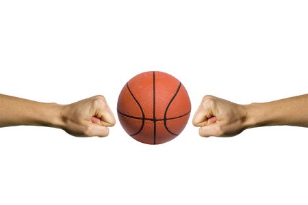 Two hands trying to smashing a basketballの写真素材