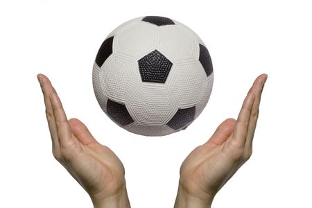 Two hands praying for a soccer gameの写真素材