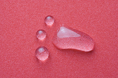 a macro of drops looking like a foot の写真素材
