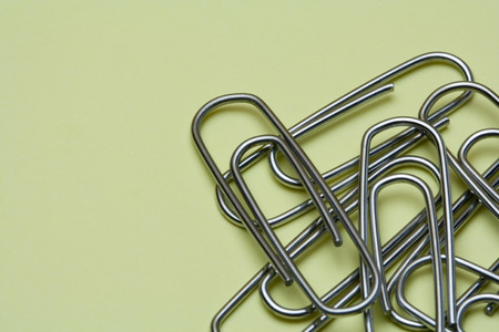 business paper clips in a color background