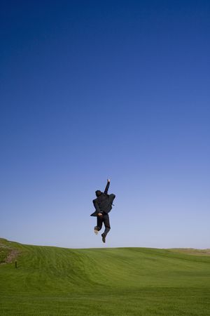 Enjoying the business sucess on a golf courseの写真素材