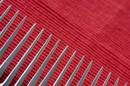 a fork perspective with a red background (soft and selective focus)の写真素材