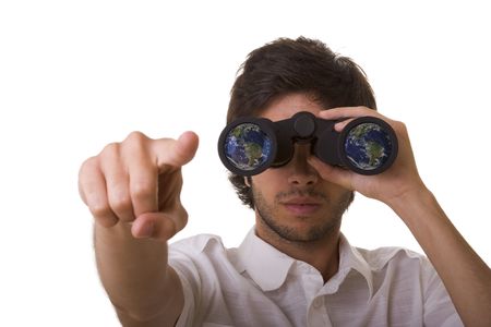 young men looking through the binocular to find the blue earth (selective focus)の写真素材