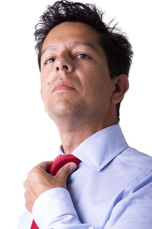 businessman adjusting his necktie in a day of great stressの写真素材