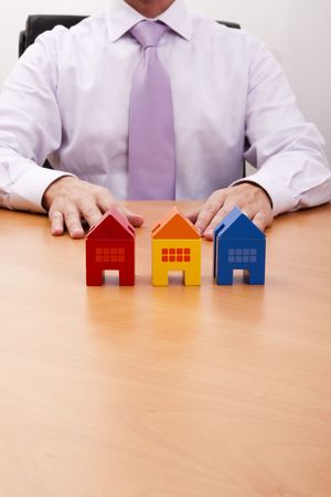 businessman selling a new house at his office (selective focus)の写真素材