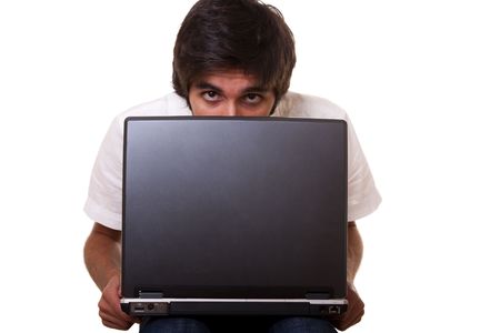 men working with his laptop (isolated on white)の写真素材