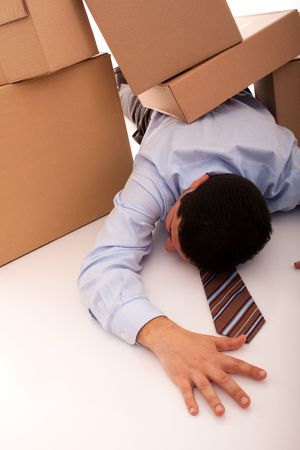 accident with some businessman carrying a pile of cardboard boxesの写真素材