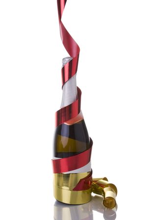 news year eve champagne bottle isolated on whiteの写真素材