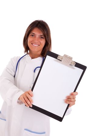 friendly woman doctor showing a blank paper in a  clipboard (isolated on white)の写真素材