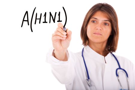 doctor writing a world alert for the swine influenza A(H1N1) (selective focus)の写真素材