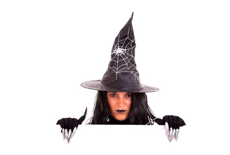 halloween witch holding a blank banner (isolated on white)の写真素材