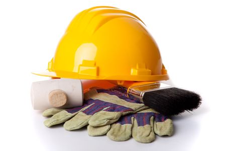 mix of protection and working construction tools over a white backgroundの写真素材