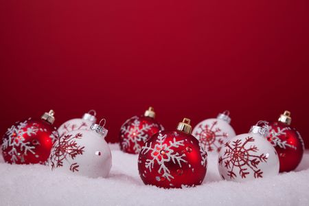 red and white christmas ornament background (selective focus)の写真素材