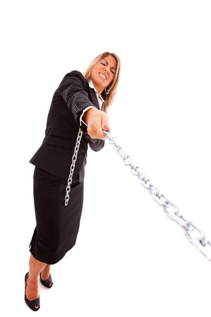 businesswoman pushing a chain (isolated on white)の写真素材