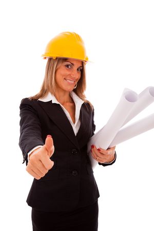businesswoman with blueprint projects and a construction helmet (isolated on white)の写真素材