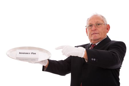 Senior businessman offering you the best solution for a insurance planの写真素材