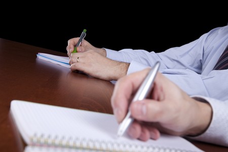 hands of some businessman meeting (focus at the hands in the background)の写真素材