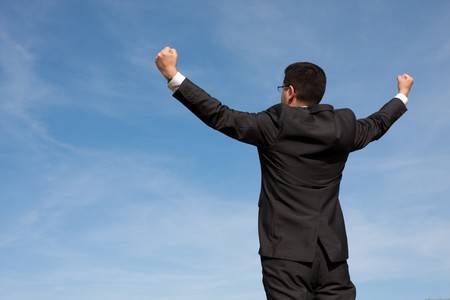businessman showing his success at the fieldの写真素材