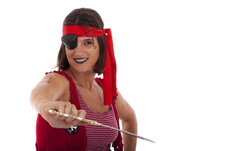 happy young woman dressed with a pirate outfit (isolated on white)の写真素材