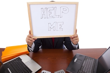 businessman asking for help (hiding his head)の写真素材