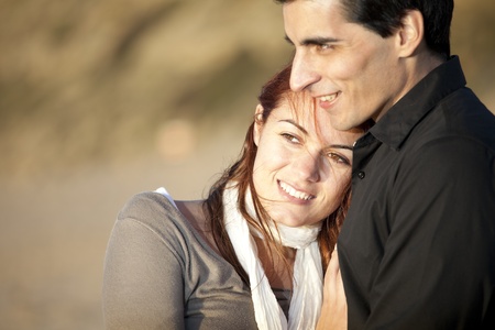 Love and affection between a young couple in outdoor (selective focus with shallow DOF)