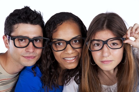 Three smart student friends looking with eyeglassesの写真素材
