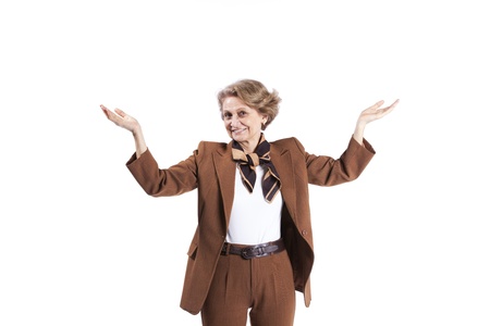 Beautiful senior woman smiling with her arms raised (isolated on white)