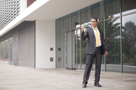 Happy businessman celebrating his successの写真素材