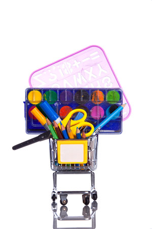 shopping cart full of education material (selective focus)の写真素材