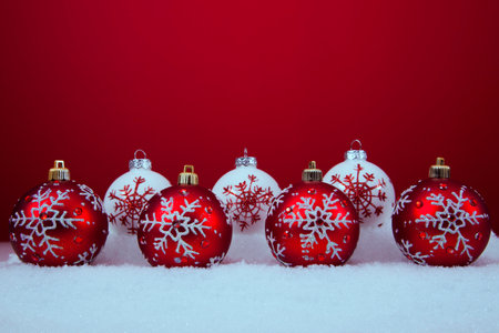 red and white christmas ornament background (selective focus)の写真素材