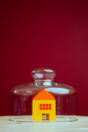 House protected inside a glass shieldの写真素材