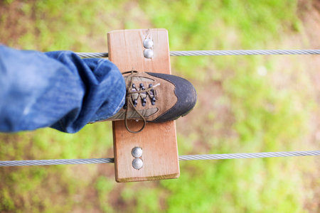 The risk of walking many feet above the groundの写真素材