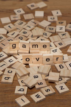 Wooden letters composing the words "game over"の写真素材