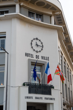 BIARRITZ, FRANCE - DECEMBER 23, 2020: Exterior view of the art deco style town hall of the city of Biarritz. "Town hall" and "Liberty, Equality, Fraternity" are written in French on the facadeのeditorial素材