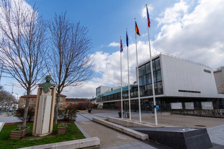 SÃ¨vres, France - February 26, 2021: View of the Charles de Gaulle square with the bust of Charles de Gaulle and the college of SÃ¨vres (international sections)のeditorial素材