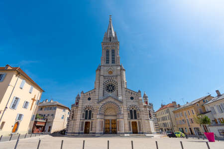 Exterior view of Notre-Dame-et-Saint-Arnoux Cathedral, of the Catholic Diocese of Gap, France, built at the end of the 19th century in the neo-Gothic styleの写真素材