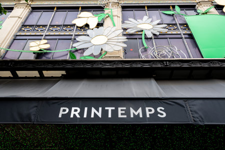 Close-up of the word 'Printemps' written on a black awning on the facade of the historic building of Printemps Haussmann, the world famous Parisian department storeのeditorial素材