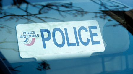 Paris, France - January 5, 2024: Close-up of the sun visor plate of an unmarked police vehicle with the word "POLICE" and the logo of the French national policeのeditorial素材
