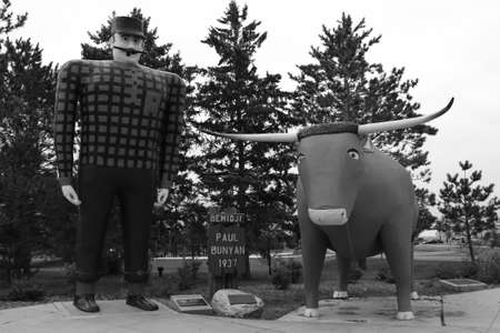 Black and white photo of famous Paul Bunyan and Babe statues.   Bemidji, Minnesota, USA.の写真素材
