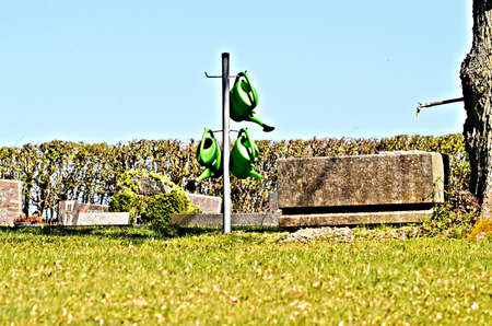 watering cans on a stand