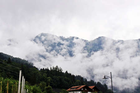 white clouds and blue mountainsの写真素材
