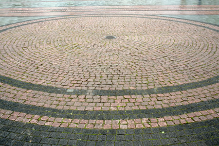 Cobblestone walkway in the city. Abstract background.の写真素材