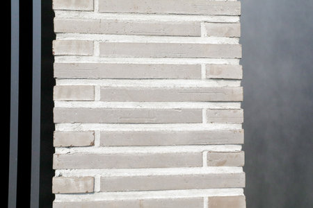 White brick wall texture background close up with copy space for text.の写真素材